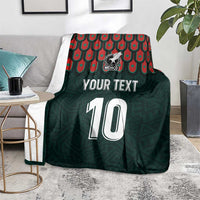 Dark green football jersey blanket with Mexican crest, number 10, and red-teal border