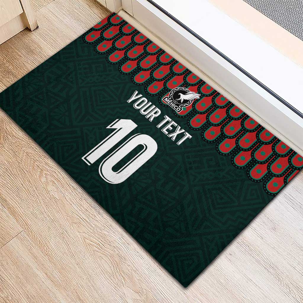 Dark green rubber doormat showing corner view with red border, crest, YOUR TEXT and 10