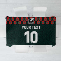 Dark green football-themed tablecloth with decorative border and large “10” graphic