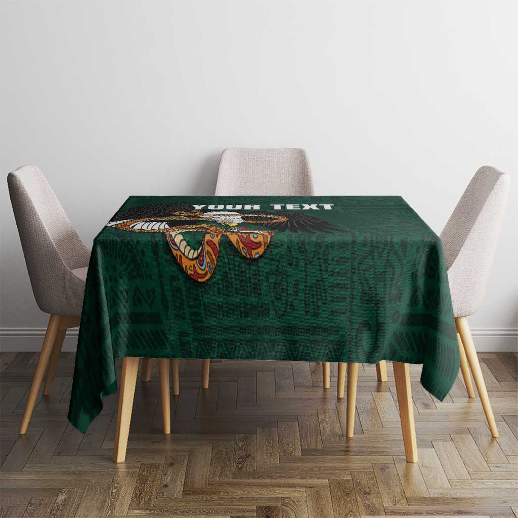 Green tablecloth on small table with eagle motif and placeholder text near top edge.