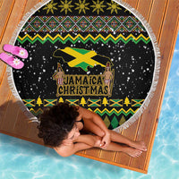 Round black beach blanket with Jamaica Christmas graphic, patterned green-yellow border, fringe
