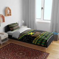 Black bedding set with Jamaican Christmas graphic, green-and-yellow geometric bands, diamond trim