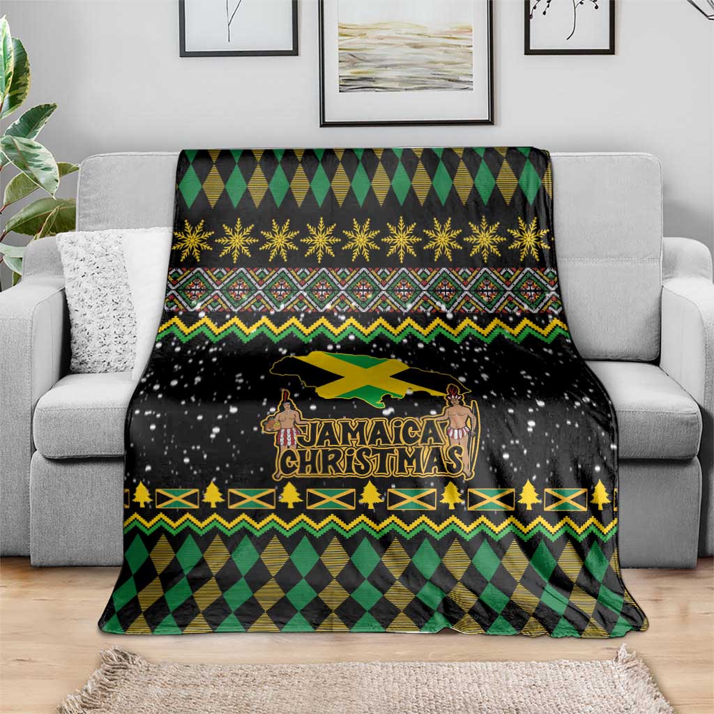 Black Christmas blanket with Jamaica Christmas logo and argyle green, yellow, and gold border