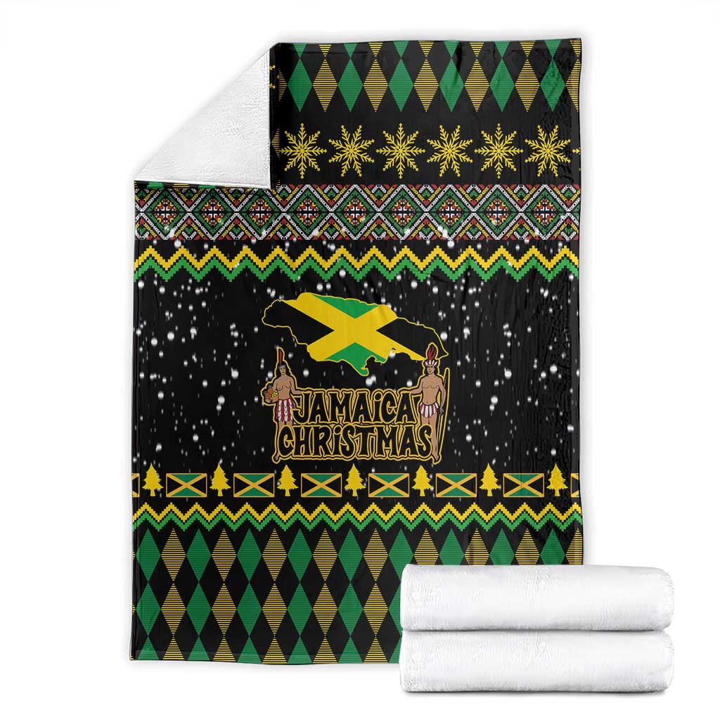 Black Christmas blanket folded with gold star row, Jamaica graphic, and green diamond design