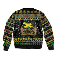 Black bomber jacket with zip front, ribbed cuffs, Jamaica Christmas flag graphic