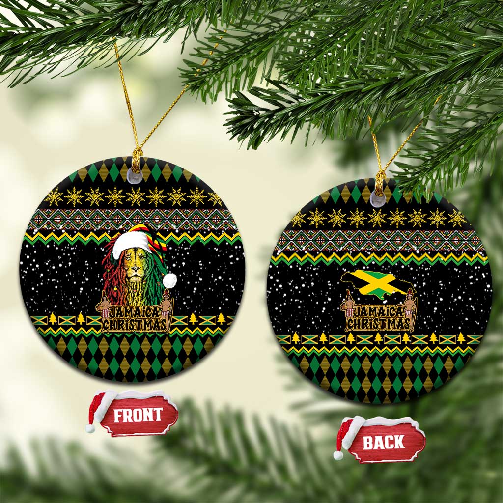 Black round ceramic Christmas ornament with Rastafarian lion and Jamaican Christmas design, on gold string