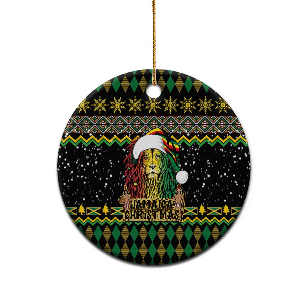 Black round ceramic Christmas ornament featuring Rastafarian lion, Jamaican Christmas text, gold hanging loop