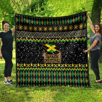 Black quilt with green geometric stripes, yellow star trim, and Jamaica Christmas lion graphic