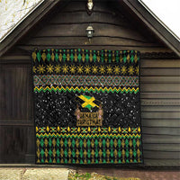 Black quilt with green diamond sections, gold snowflake stars, and Jamaica Christmas lion center