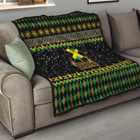 Black quilt throw with green diamond pattern and yellow star trim, featuring Jamaica Christmas lion