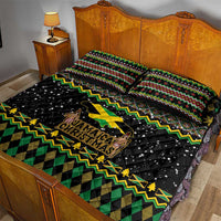 Quilt bed set with Jamaica Christmas lion text on black, green/yellow zigzag border