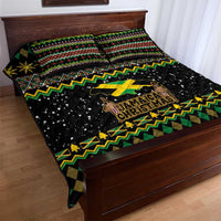 Quilt bed set: black quilt with green and yellow zigzags, stars, and Jamaican Christmas logo
