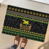 Black rubber doormat showing Jamaica Christmas logo, lion icon, green and yellow festive trim