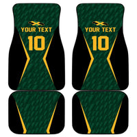 Set of four green and black car mats with yellow 'YOUR TEXT 10' cricket jersey design