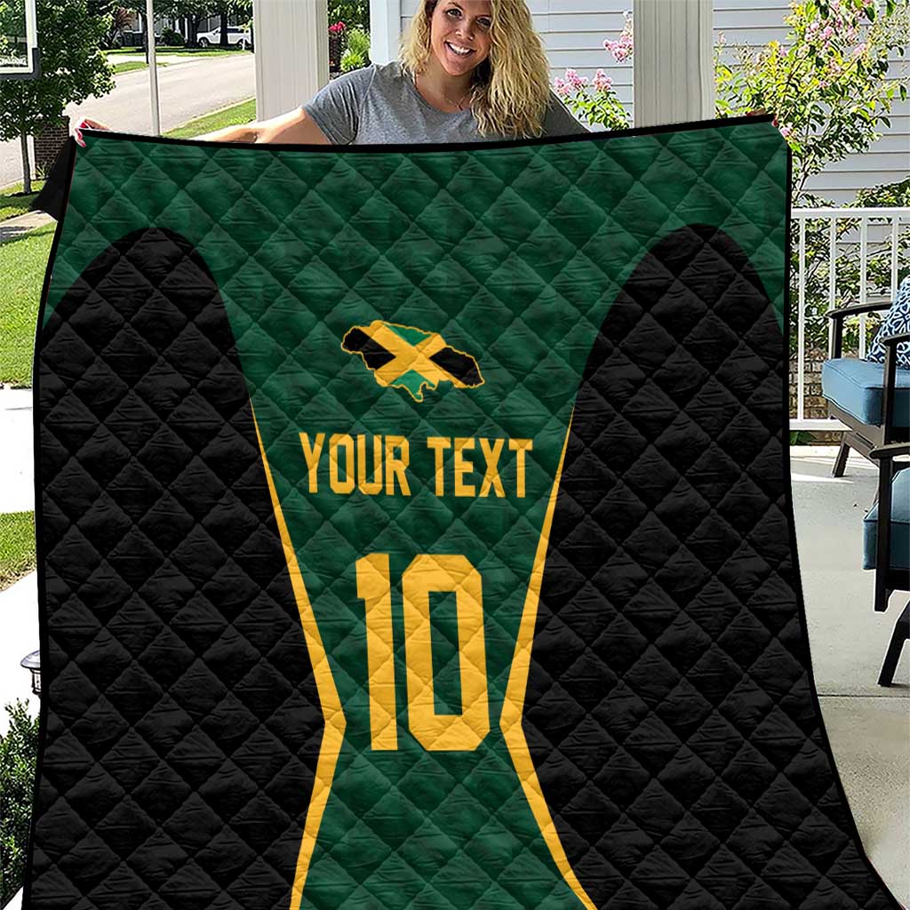 Custom quilt blanket with green center, black sides, yellow trim, and 'Your Text' 10