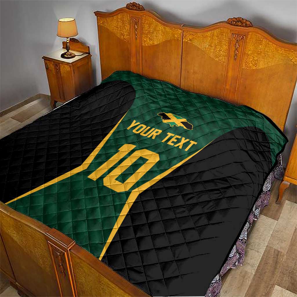 Custom quilt blanket with green jersey panel, black quilted sections, yellow 10, and 'Your Text'