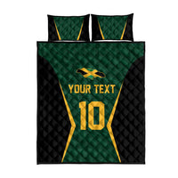 Green quilt cover with black sides and gold “YOUR TEXT” and “10”, plus 2 matching pillows
