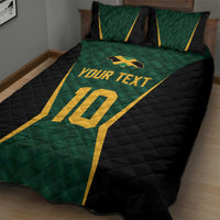 Green and black quilt bed set with gold “YOUR TEXT” and large “10” on the cover, pillows on top