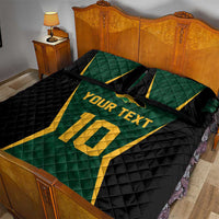 Green and black quilt bed set with gold “YOUR TEXT” and a large gold number panel, two pillows