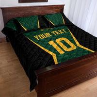 Green and black quilt bed set with gold “YOUR TEXT” and “10” print on the duvet cover