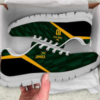 Green and black lace-up sneakers with yellow accents, white sole version