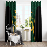 Green and black window curtains with gold jersey graphic and text, hung above a sofa corner