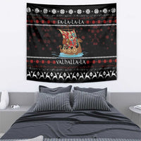 Black wall tapestry featuring Viking Santa warrior on sled with red snowflake pattern and border