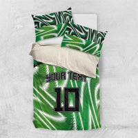 Green football bedding set with palm pattern; 'YOUR TEXT 10' on duvet and pillowcases