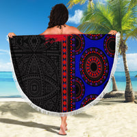 Round beach blanket with fringed border, black, blue, and red ornate design