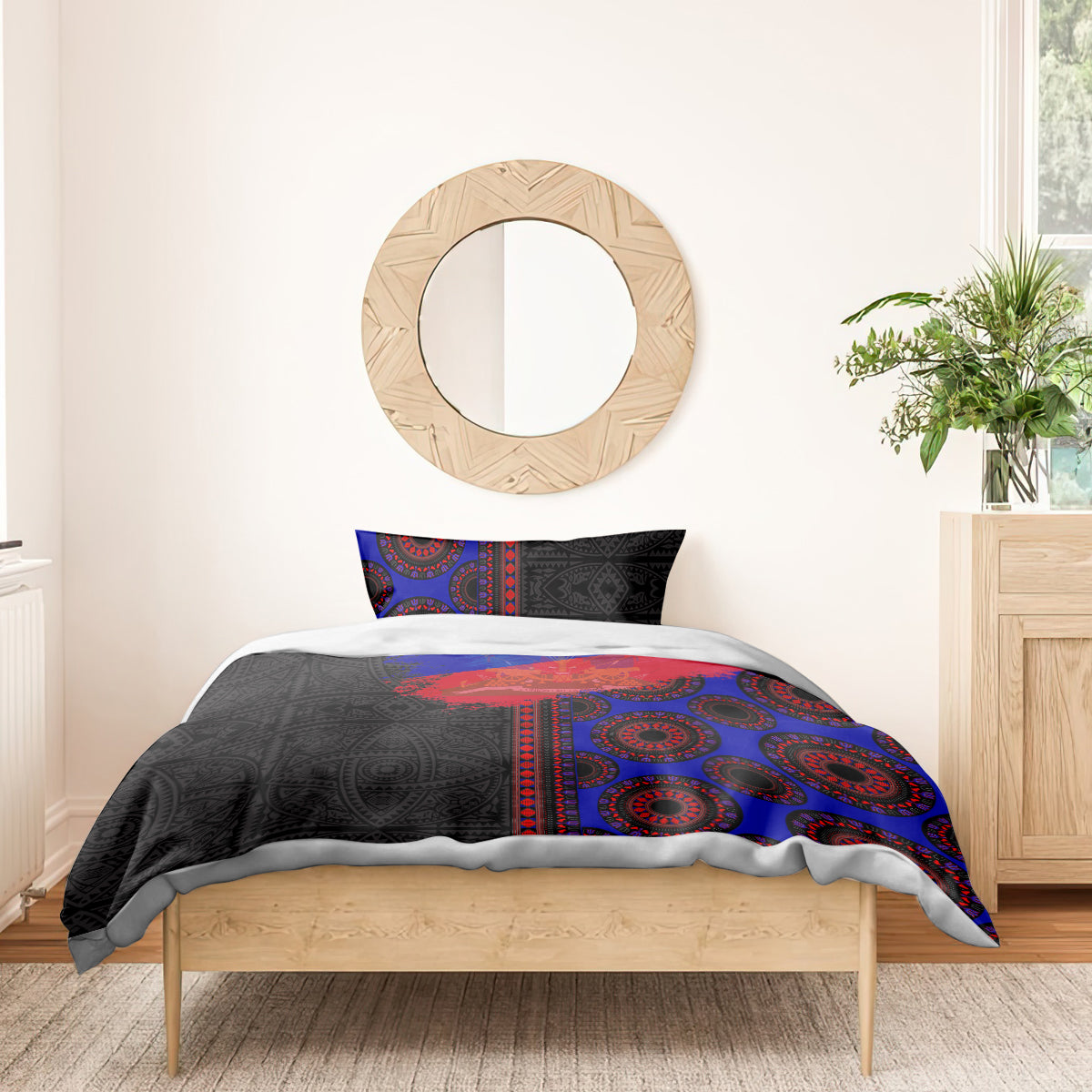 Bed bedding set with black, blue, and red patterned duvet and matching pillowcases