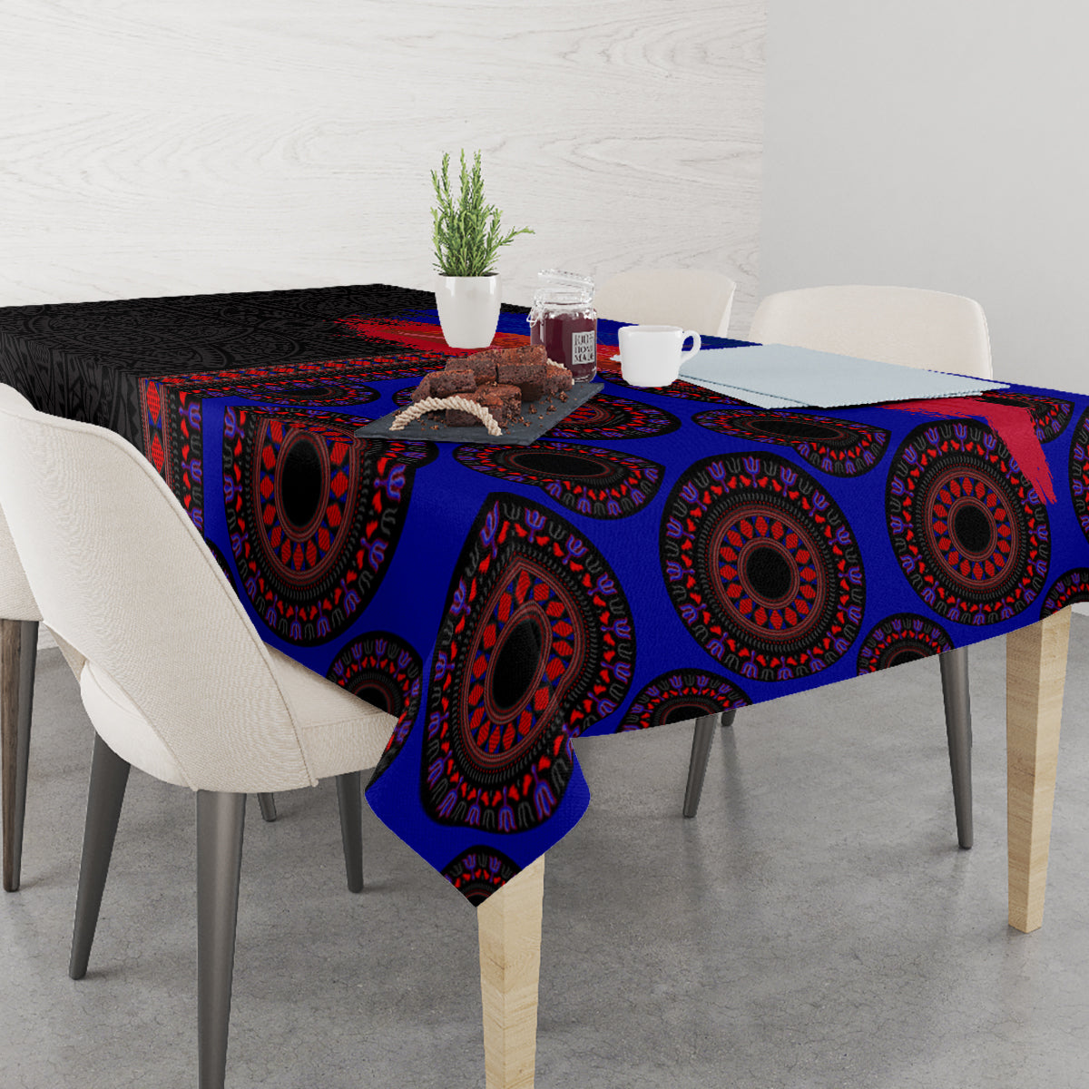 Tablecloth with blue, red, and black ornate seamless pattern covering tabletop