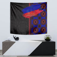 Rectangular African tapestry with black design, blue/red diagonal stripe, and red circular patterns
