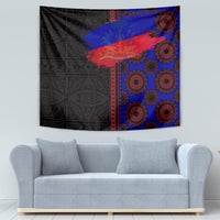 Black-and-blue African tapestry with red diagonal stripe and repeating red circle motifs