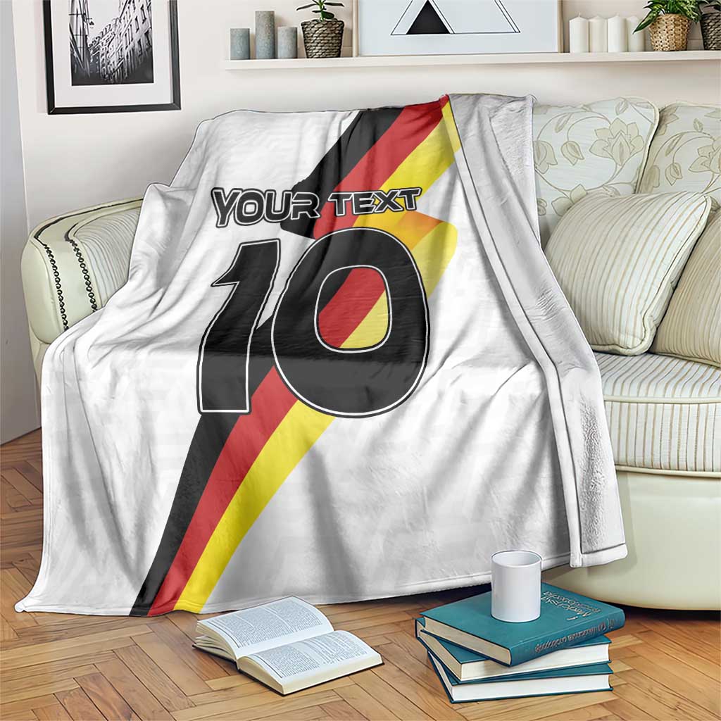 White blanket with Germany flag diagonal stripes and large 10 graphic, with 'YOUR TEXT'