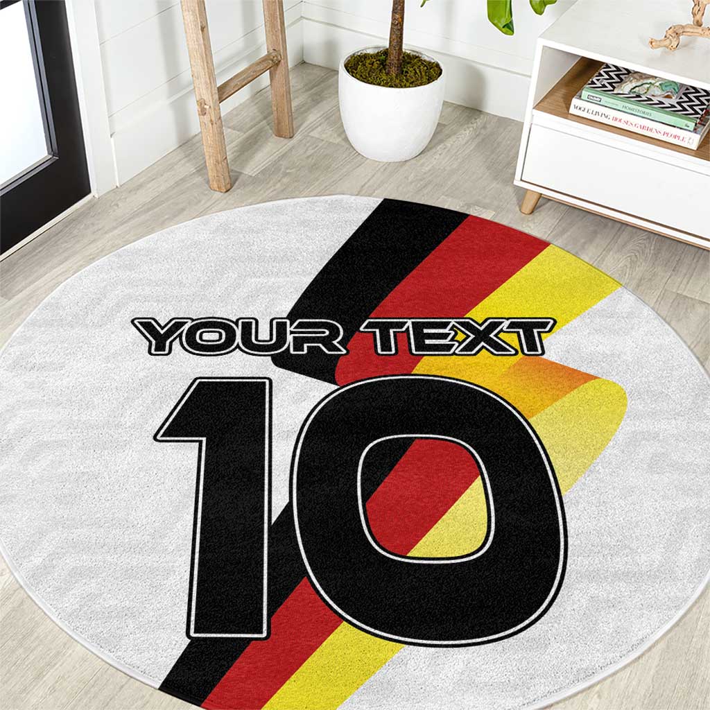 Round white Germany football rug with 'YOUR TEXT' and bold number 10 in black, red, yellow