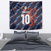 Navy football tapestry showing lion crest, 'YOUR TEXT', and number 10 with orange streaks