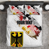 White duvet cover and pillow covers with red, black, gold eagle graphic and “YOUR TEXT”.