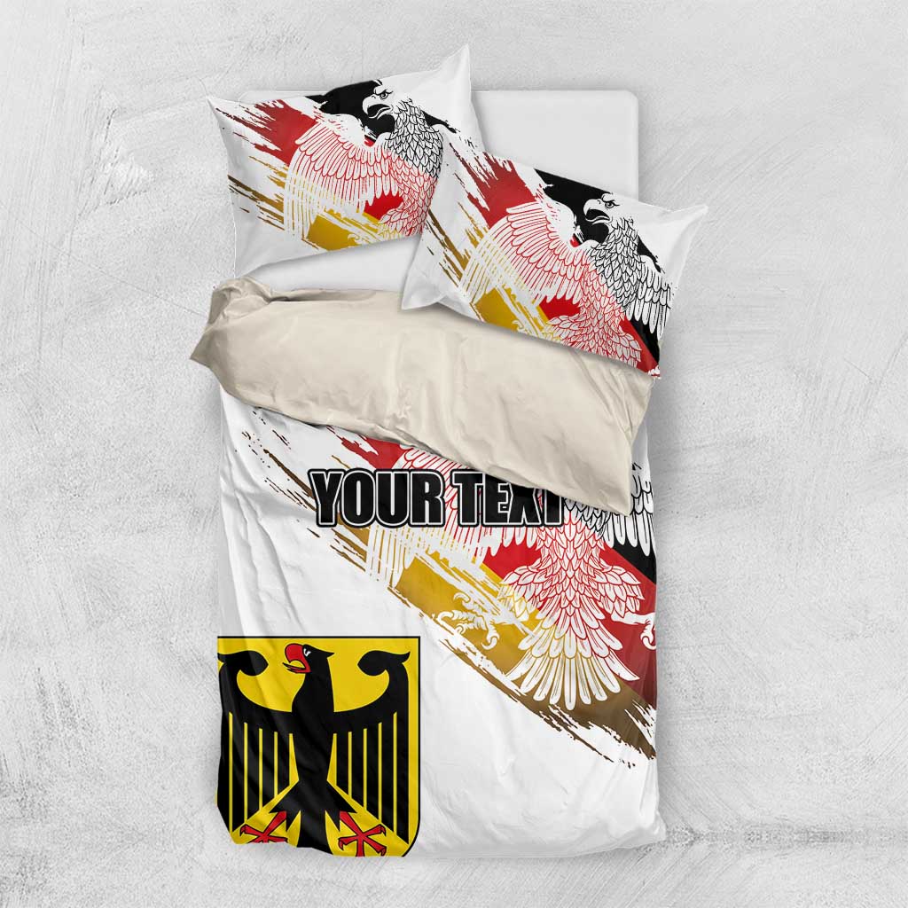White duvet and pillow set with red, black, and gold eagle print and “YOUR TEXT” panel.