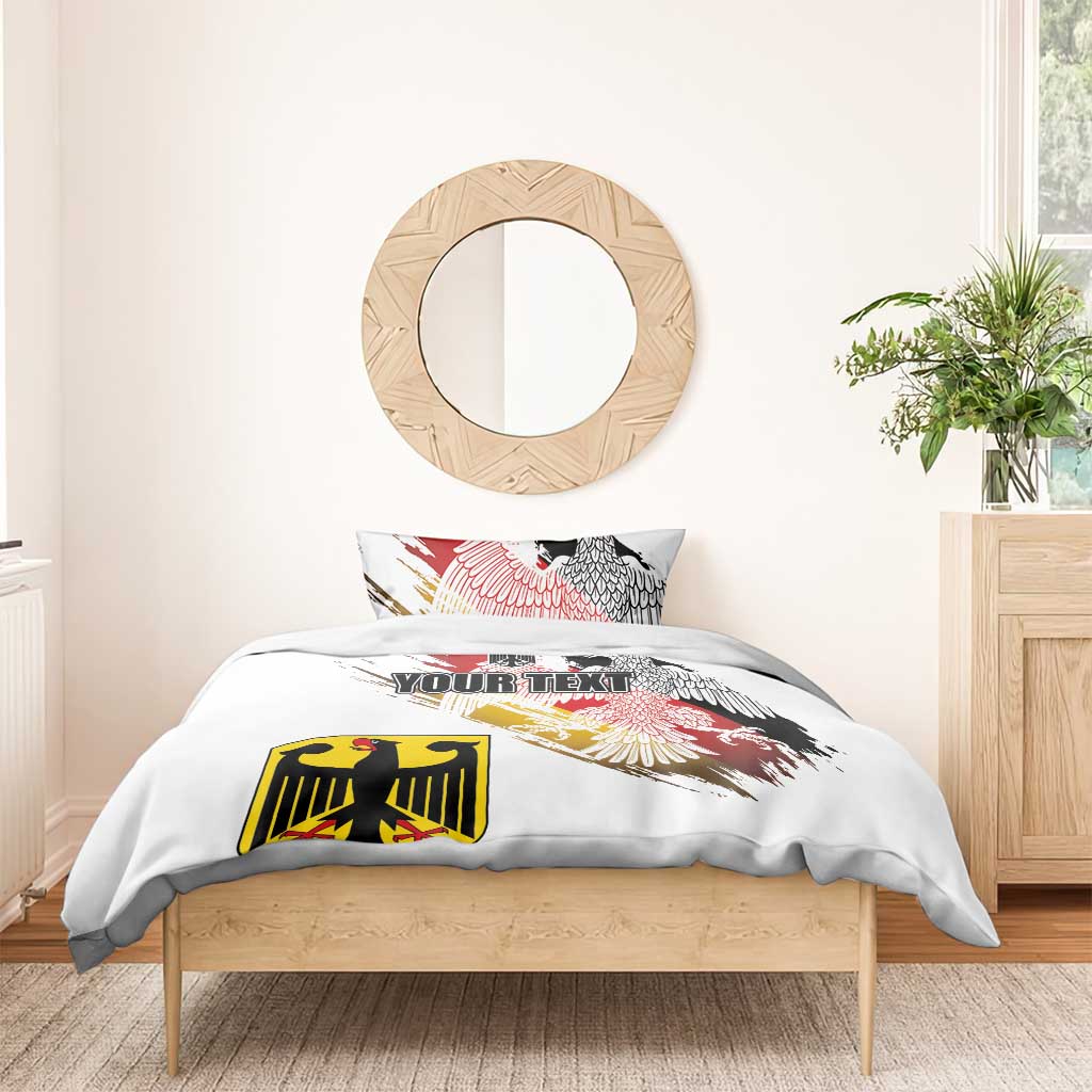 White comforter set with red and gold eagle graphic and “YOUR TEXT” on the front panel.