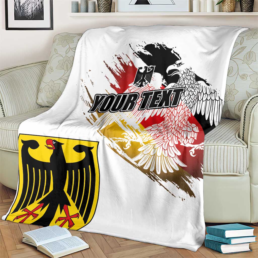 White grunge flag blanket on couch with black eagle head and red-yellow paint; 'YOUR TEXT'.