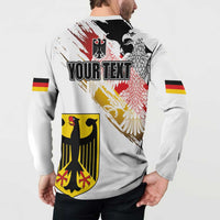 White sweatshirt back print: YOUR TEXT over Germany eagle grunge, crest, and flag stripe sleeves