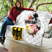 White diamond-stitched quilt showing Germany eagle seal grunge print and “YOUR TEXT”