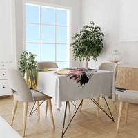 White tablecloth on dining set with German eagle and seal grunge print