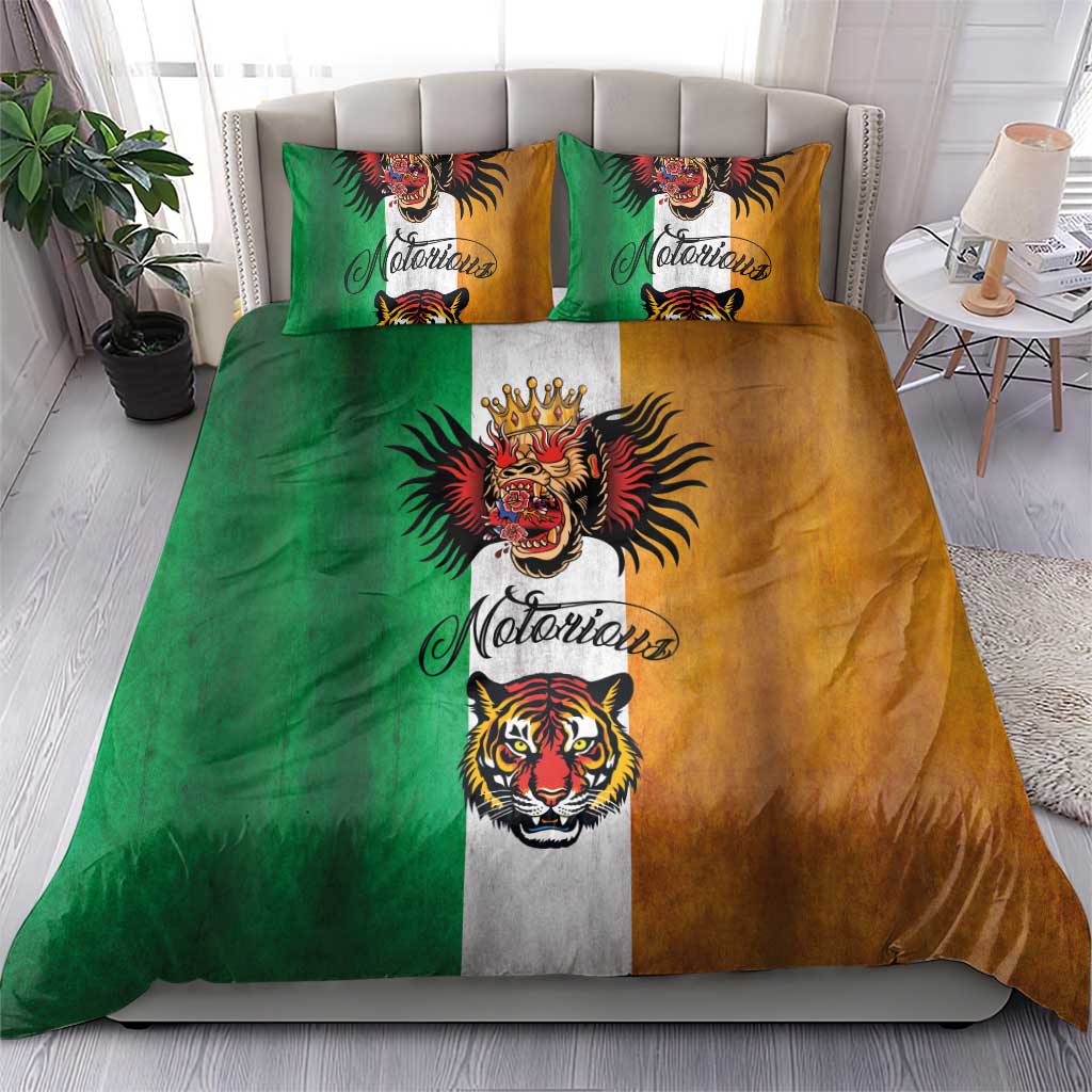 Tattoo-style bedding set with green and tan panels, gray center stripe, and animal head pillow prints