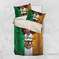 Tattoo-style bedding set with green and tan panels, gray middle stripe, and animal head designs