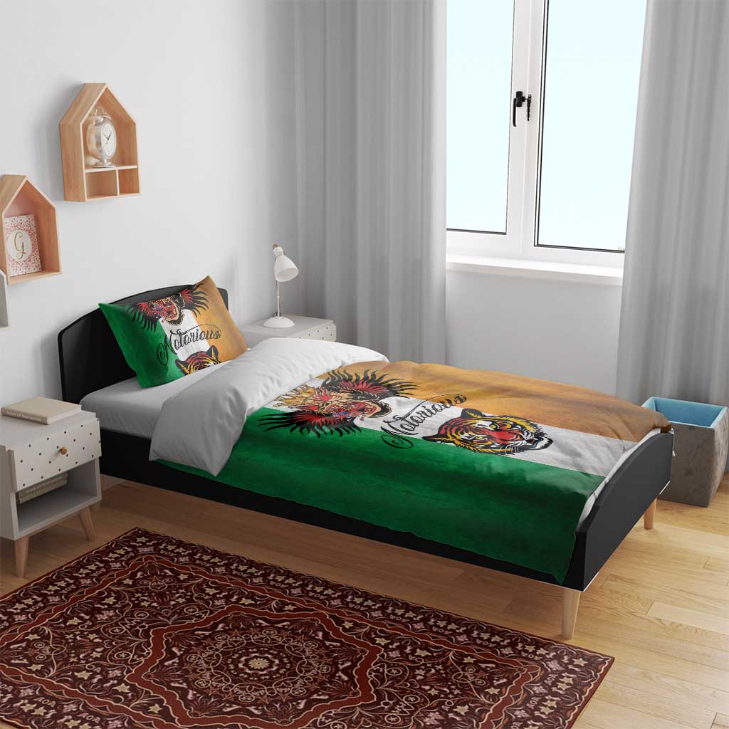 Tattoo-style bedding set with green-and-tan duvet panels and gray stripe, tiger and crowned head artwork