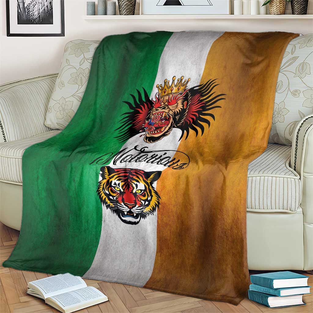 Tattoo-style throw blanket on a couch; green, gray, and brown stripes with tiger and dragon