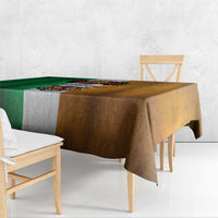 Rectangular grunge tablecloth draped on table; green left, brown right, gray center design