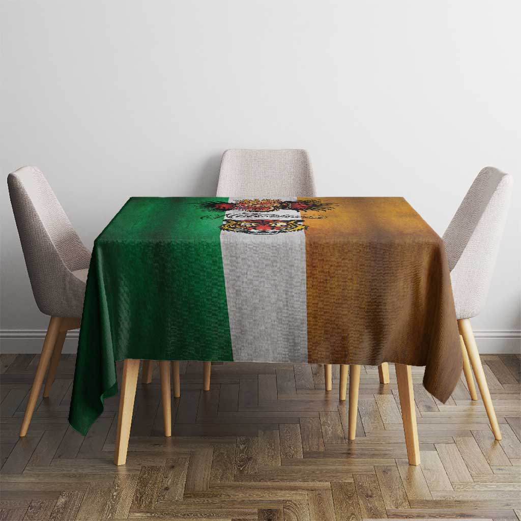Grunge rectangular tablecloth on dining table with green, brown, and gray sections and bold center art
