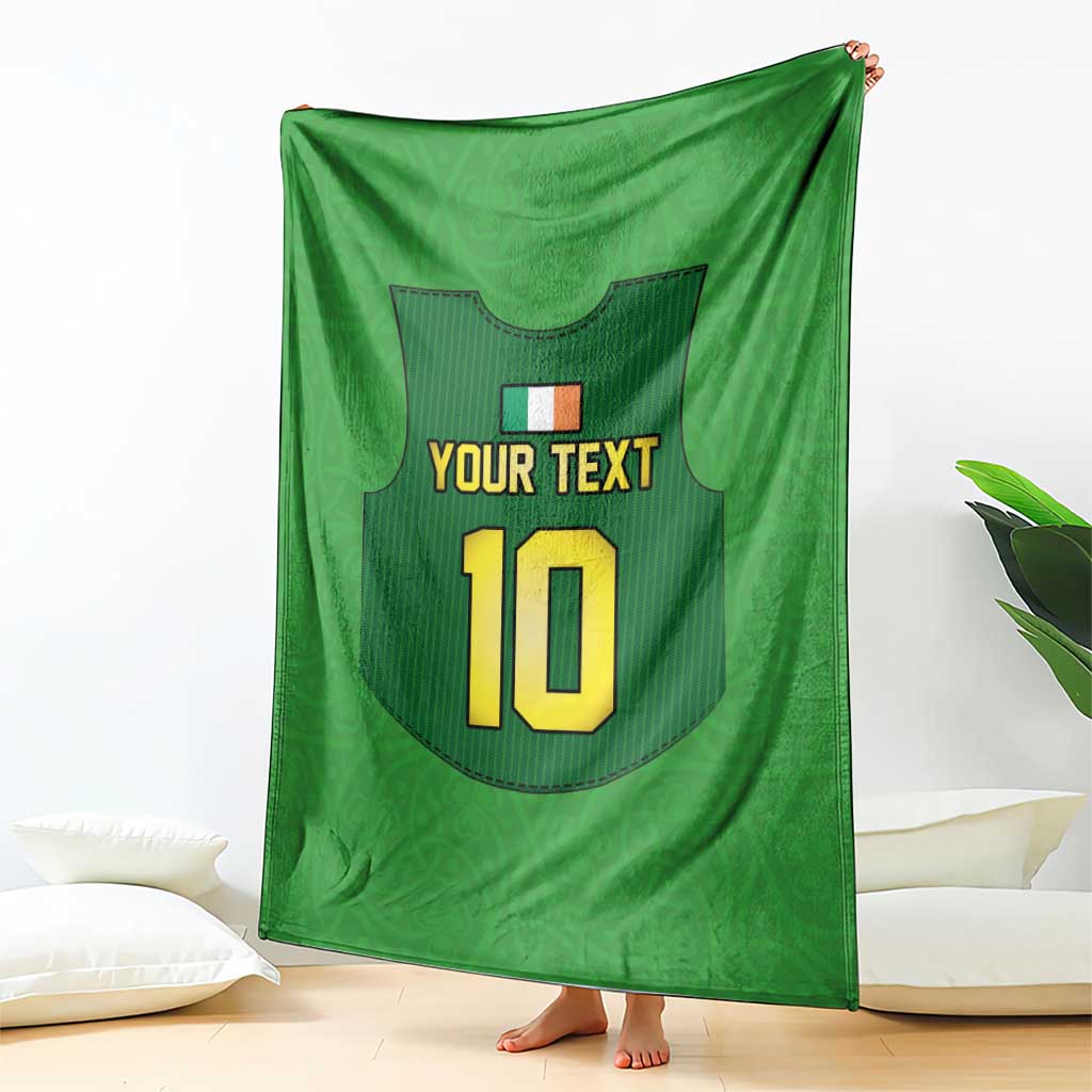 Green rugby blanket held up, showing 'YOUR TEXT' and number 10 jersey